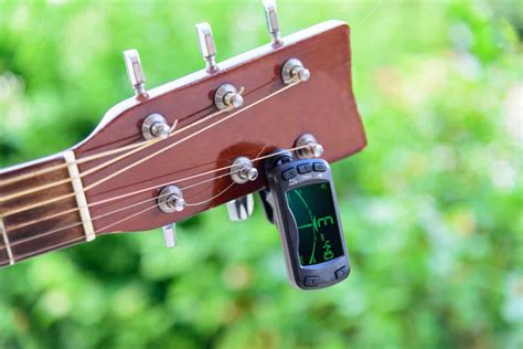 where to put tuner on guitar how do you decide which tuner to use for your acoustic or electric guitar